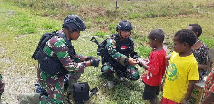 Kegiatan Satgas Pamtas Yonif 501 Di Distrik Sugapa